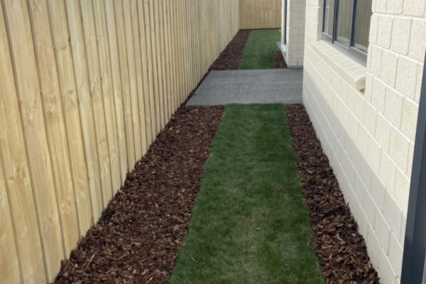 The Lawn Man Sam can add garden mulch to your backyard in North Canterbury