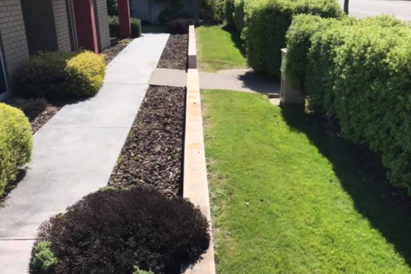 The Lawn Man Sam can add garden mulch to your backyard in North Canterbury